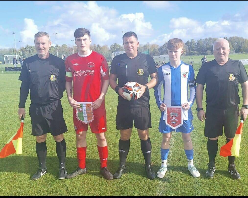Assistant Referee Patrick O’Keeffe, Cork Youth captain Kellan Crowe, referee Dave Finnegan, Limerick Youth captain Cathal Markham and assistant referee John Philpott before the FAI Inter-League game at Ringmahon Park. KD
