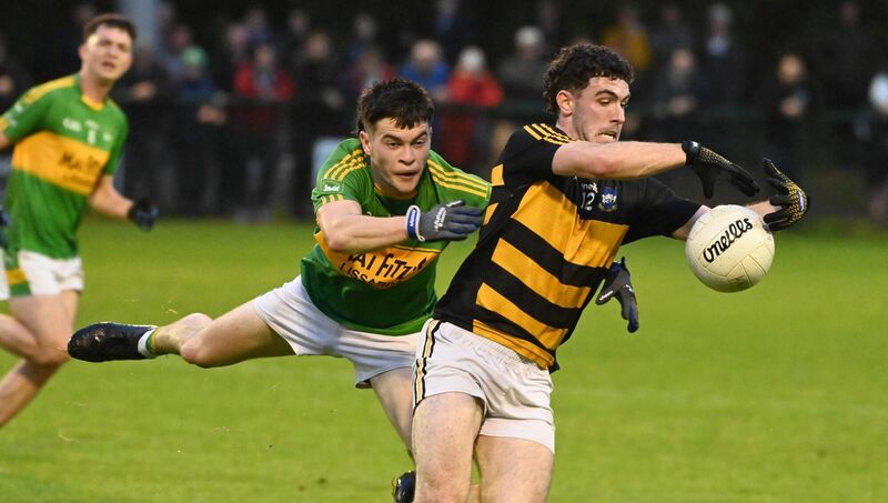 Canovee's Daire McMahon is tackled by Kilmurry's Gearóid O'Mahony during the McCarthy Insurance Group Premier JFC at Macroom last month. Picture: Eddie O'Hare Canovee's Daire McMahon is tackled by Kilmurry's Gearóid O'Mahony during the McCarthy Insurance Group Premier JFC at Macroom last month. Picture: Eddie O'Hare