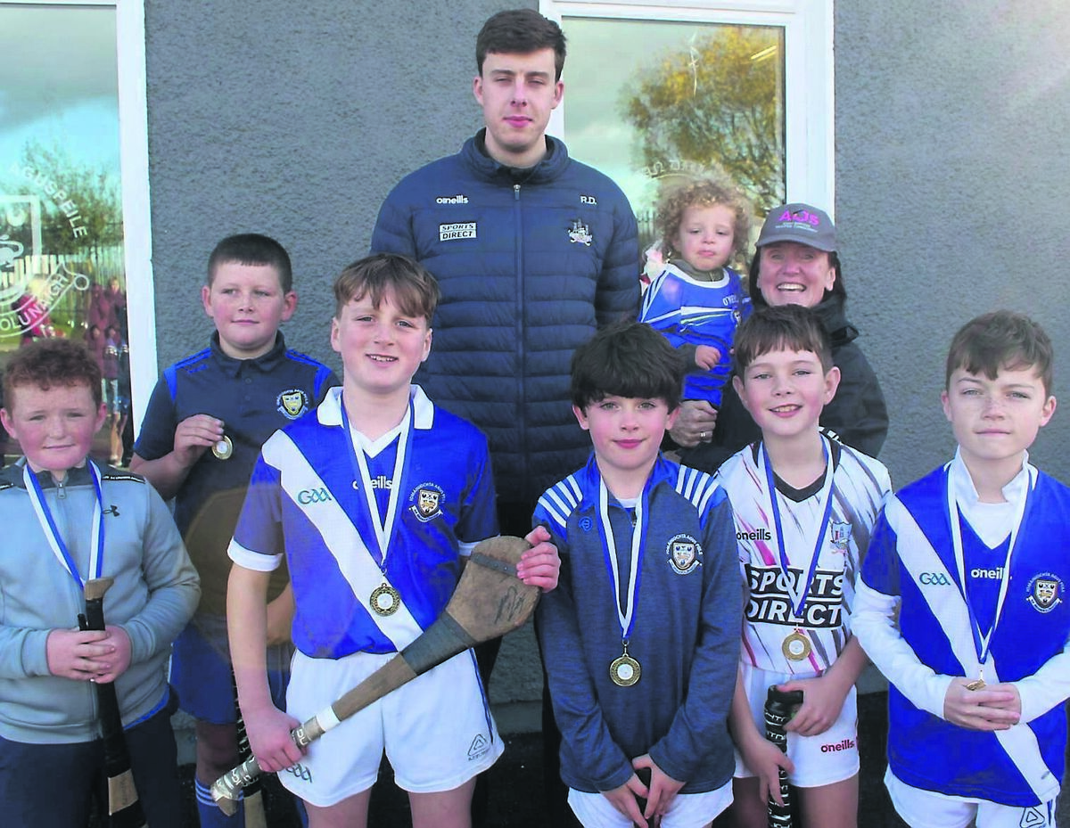 Cork hurling star Robert Downey with some of the players and supporters at the Brian Dillons GAA Club fun day.