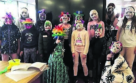 Children at Mayfield library's Halloween mask making workshop
