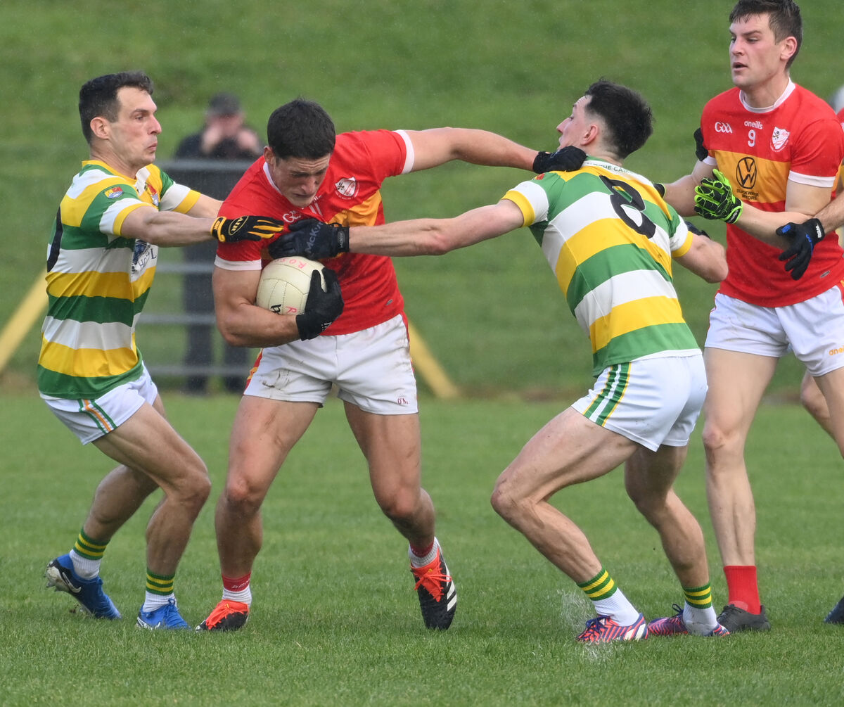 Éire Óg's Colm O'Callaghan is tackled by Carbery Rangers' John O'Rourke and Brian Hodnett during the Premier SFC relegation play-off at Enniskeane. Picture: Eddie O'Hare Éire Óg's Colm O'Callaghan is tackled by Carbery Rangers' John O'Rourke and Brian Hodnett during the Premier SFC relegation play-off at Enniskeane. Picture: Eddie O'Hare
