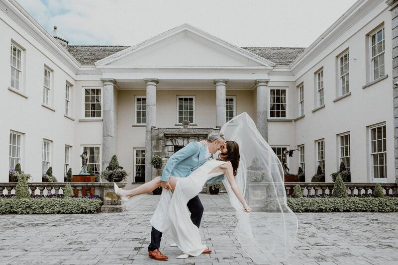 The happy couple outside their wedding venue, Castlemartyr Hotel Resort in East Cork.