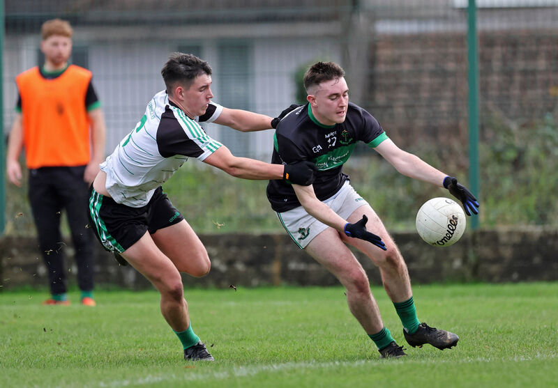 James Burke, Douglas, tackles Sean Nagle, Nemo Rangers. Picture: Jim Coughlan. James Burke, Douglas, tackles Sean Nagle, Nemo Rangers. Picture: Jim Coughlan.