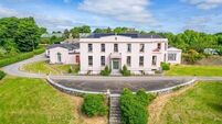 200-year-old Cork home with equestrian facilities and Gothic lodge comes to the market