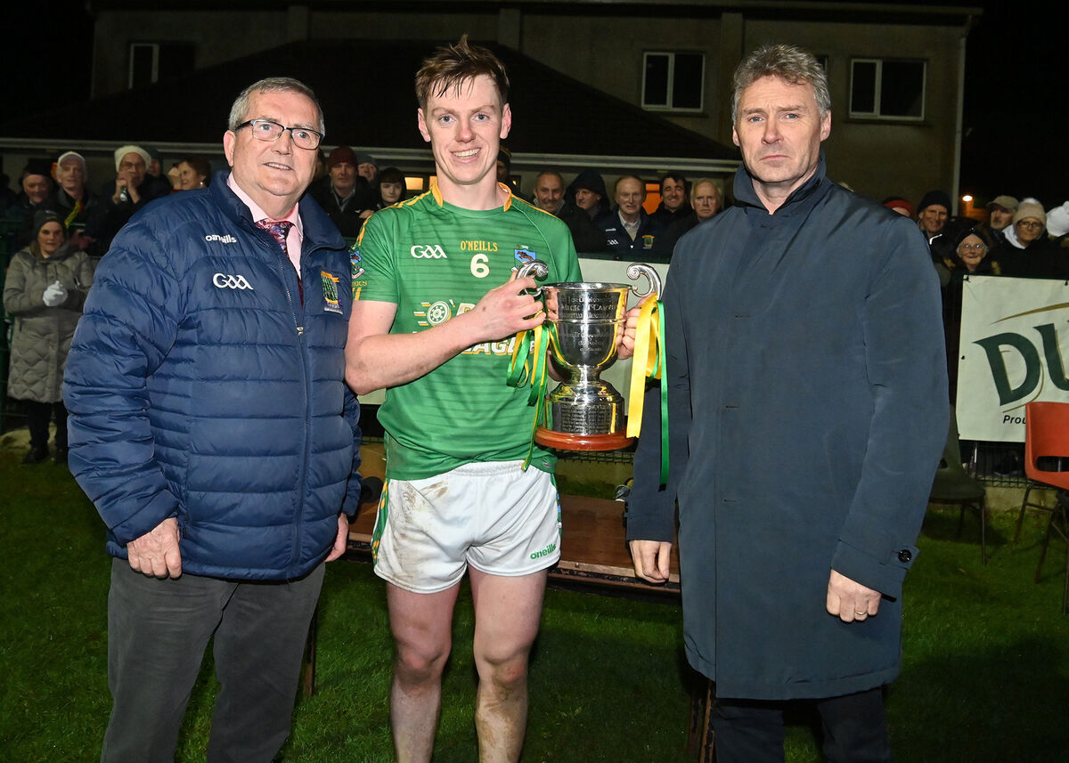 Bandon Co-op Carbery Junior A Football final at Sam Maguire Park Dunmanway. Kilmacabea captain Diarmuid O’Callaghan with the Mick McCarthy Cup his team’s victory over Diarmuid O’Mathunas in the Bandon Co-op Carbery Junior A Football final at Sam Maguire Park Dunmanway. Also included are (left to right): Aidan O’Rourke, Chairman Carbery GAA and Denis Mullane (Bandon Co-op). Picture: Martin Walsh. Bandon Co-op Carbery Junior A Football final at Sam Maguire Park Dunmanway. Kilmacabea captain Diarmuid O’Callaghan with the Mick McCarthy Cup his team’s victory over Diarmuid O’Mathunas in the Bandon Co-op Carbery Junior A Football final at Sam Maguire Park Dunmanway. Also included are (left to right): Aidan O’Rourke, Chairman Carbery GAA and Denis Mullane (Bandon Co-op). Picture: Martin Walsh.