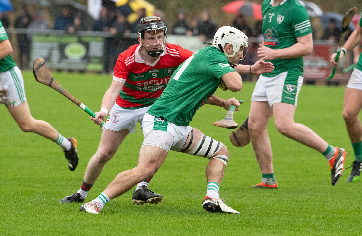  Killeagh's Davy Kelleher attempts to break away from Dylan Foley of Carraig Na bhFear. Picture: Howard Crowdy
