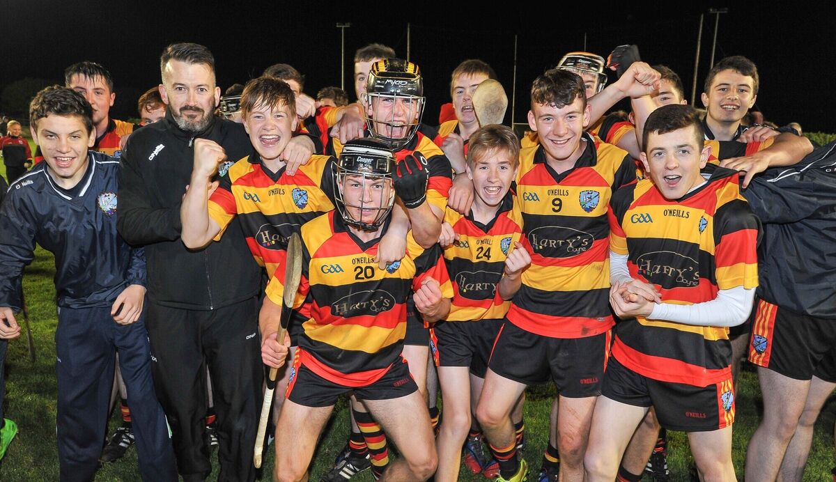 St Colman's players celebrate with their manager Donal Óg Cusack after beating Charleville in the Premier 2 MHC final in 2015. Picture: David Keane