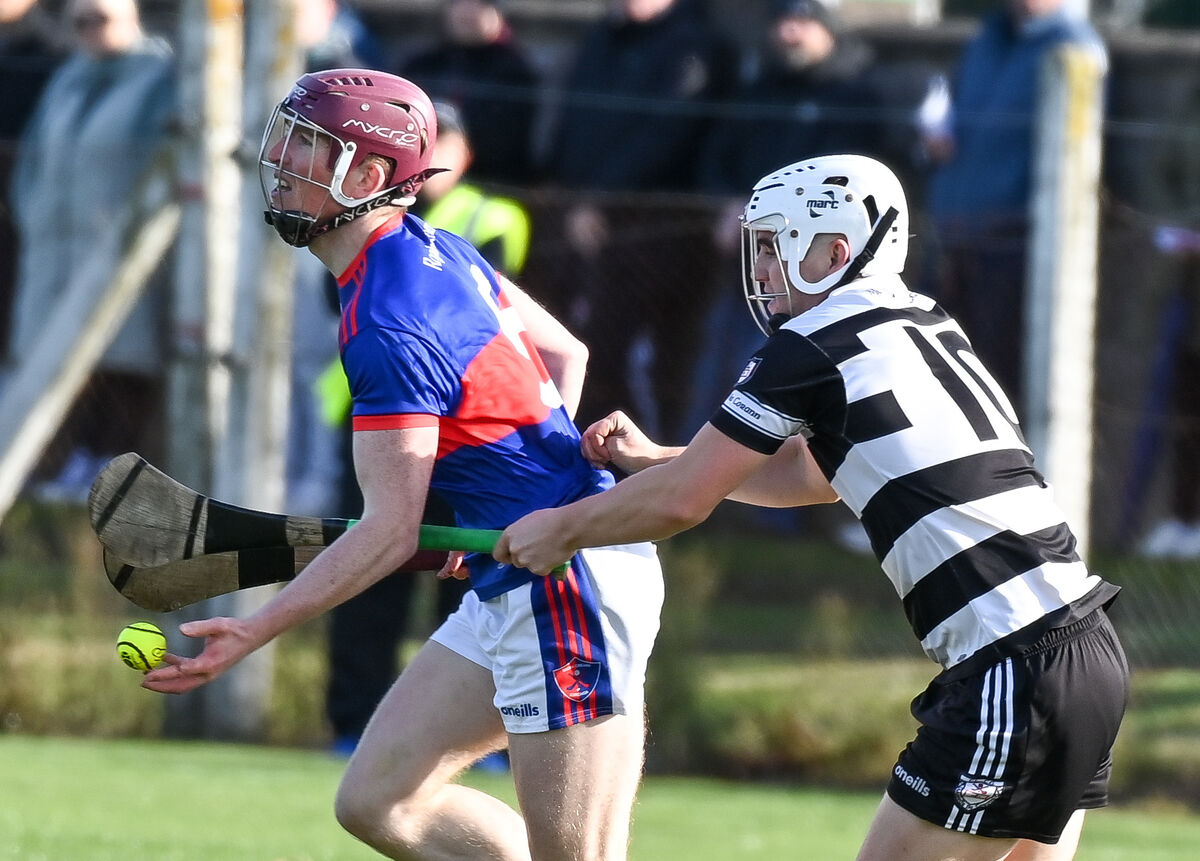 Dara Twomey of Erin's Own wins possession ahead of Midleton's Gary Carroll in the Co-op SuperStores IAHC semi-final at Cobh last month. Picture: David Keane