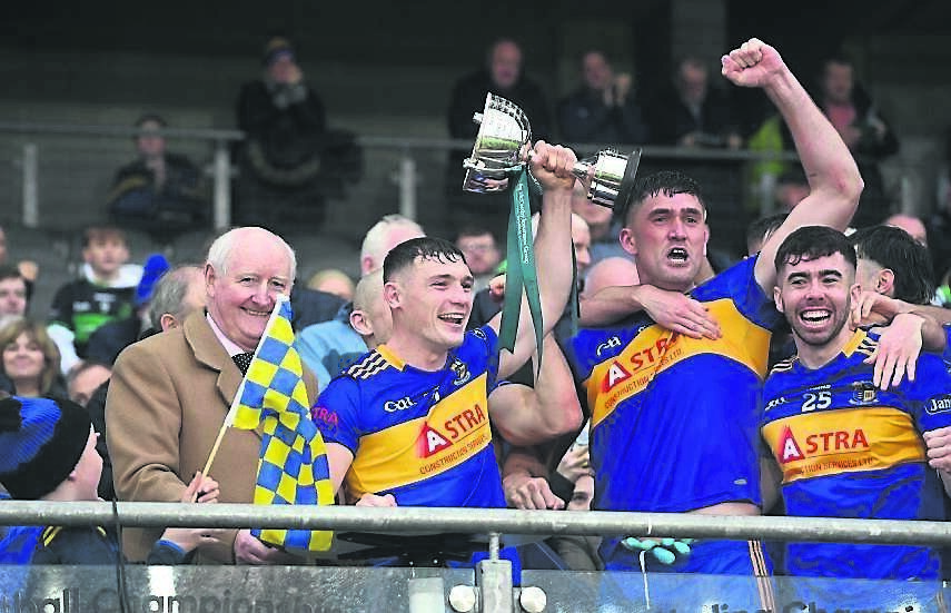 Carrigaline celebrations as captain Jack McCarthy lifts the cup after their win in the McCarthy Insurance Group Senior A Football Championship.	Picture: Larry Cummins
                    