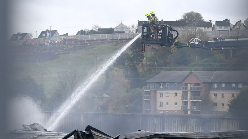 Fire crews continue to dampen hot spots following fire at commercial building on Cork's northside Fire crews continue to dampen hot spots following fire at commercial building on Cork's northside