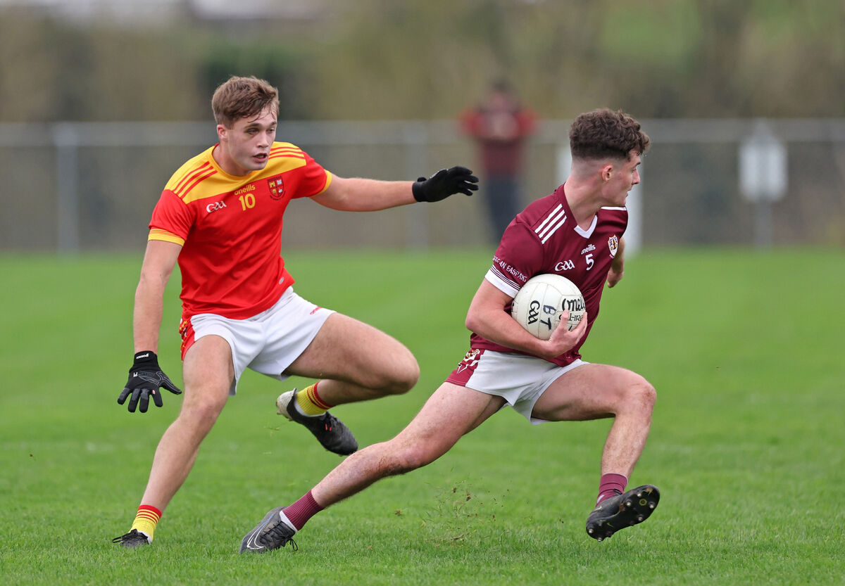  Daniel O'Sullivan, Mallow, tackles Odhran Foley, Bishopstown. Picture: Jim Coughlan.