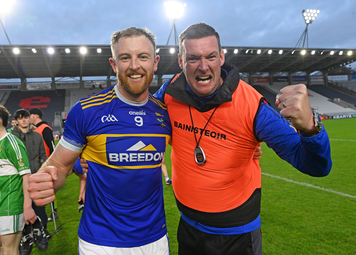 Kilshannig's Killian O'Hanlon and manager Denis Reen celebrate after defeating Aghabullogue. Picture: Eddie O'Hare