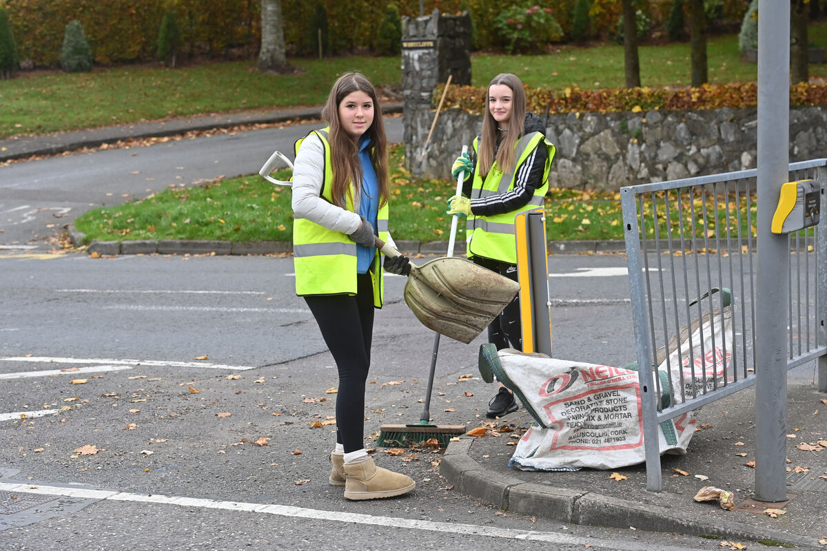  TY students Sinead Comber and Hannah Rose Ryan working hard after Ballincollig won the SuperValu Tidy Towns gold medal. Picture Dan Linehan