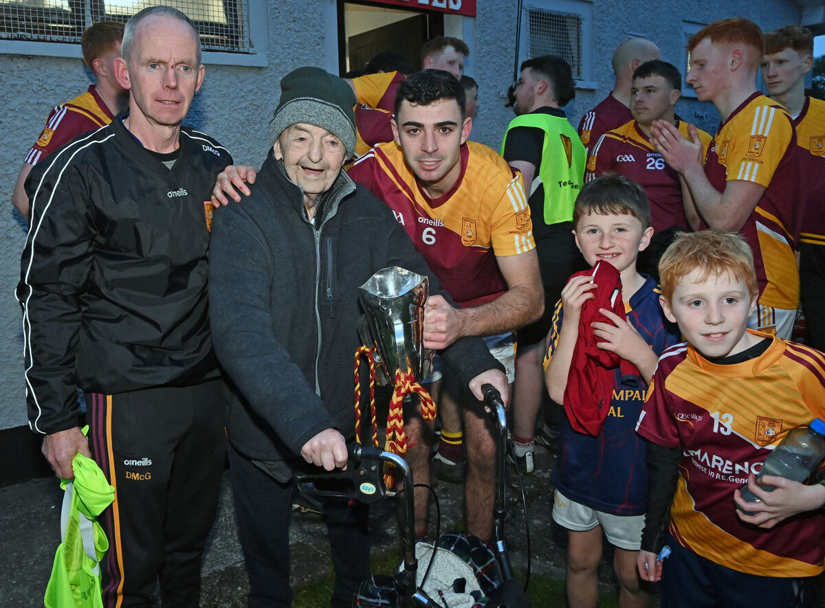 Whitechurch captain Mark Callanan with chairman Dave McGrath and Tommy Buckley, club president after defeating Passage West in the AOS security Junior A Hurling Championship final at Ballinlough. Picture: Eddie O'Hare
