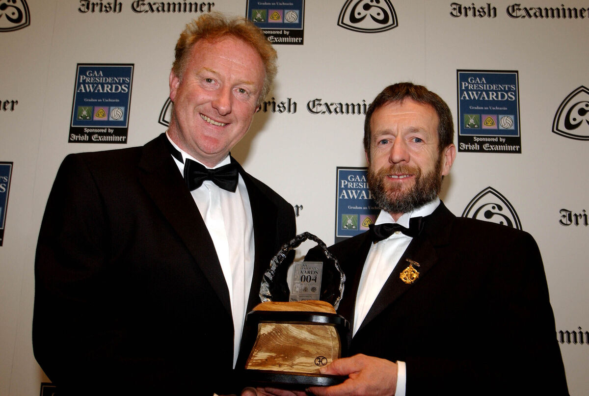 Eddie Murphy receiving a GAA President's Award from Seán Kelly in 2005. Picture: Maura Hickey Eddie Murphy receiving a GAA President's Award from Seán Kelly in 2005. Picture: Maura Hickey