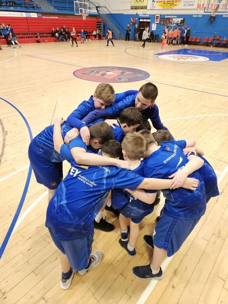 The Neptune Sports Inclusion team in a team huddle after one of their training sessions at the Neptune Stadium recently. KD 
