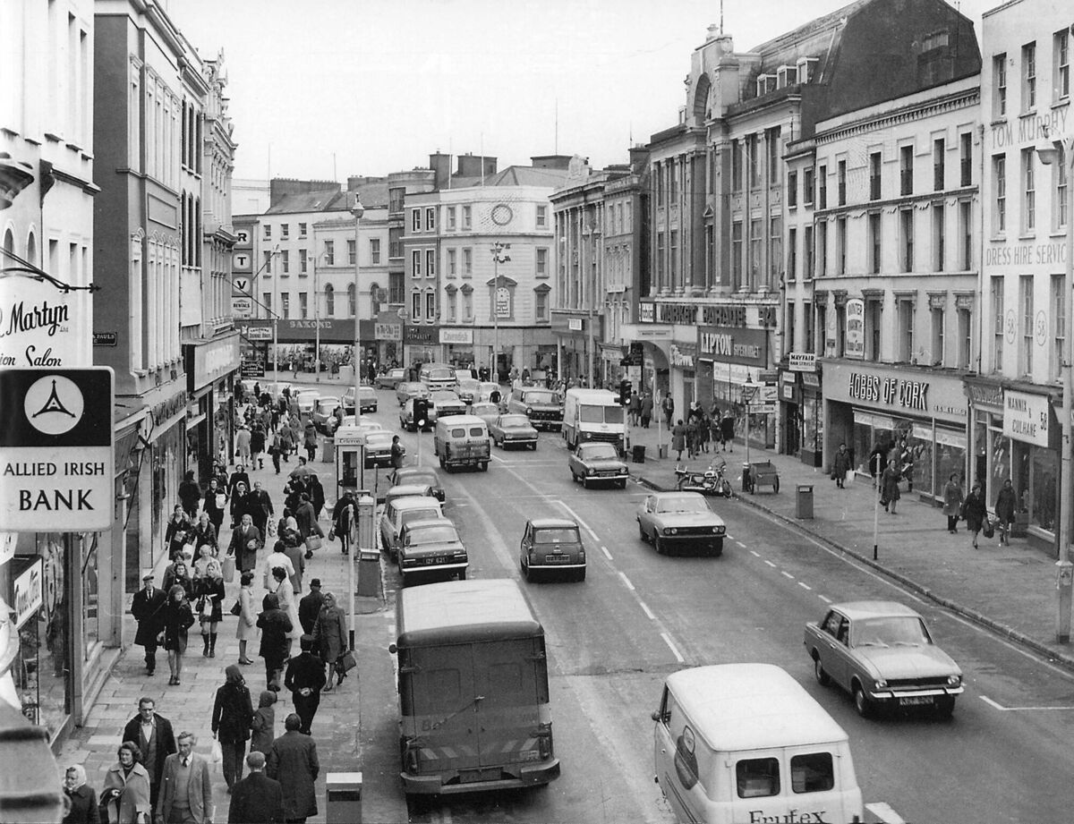 Patrick Street in the 1970s - you can see a phone kiosk on the pavement on the left.