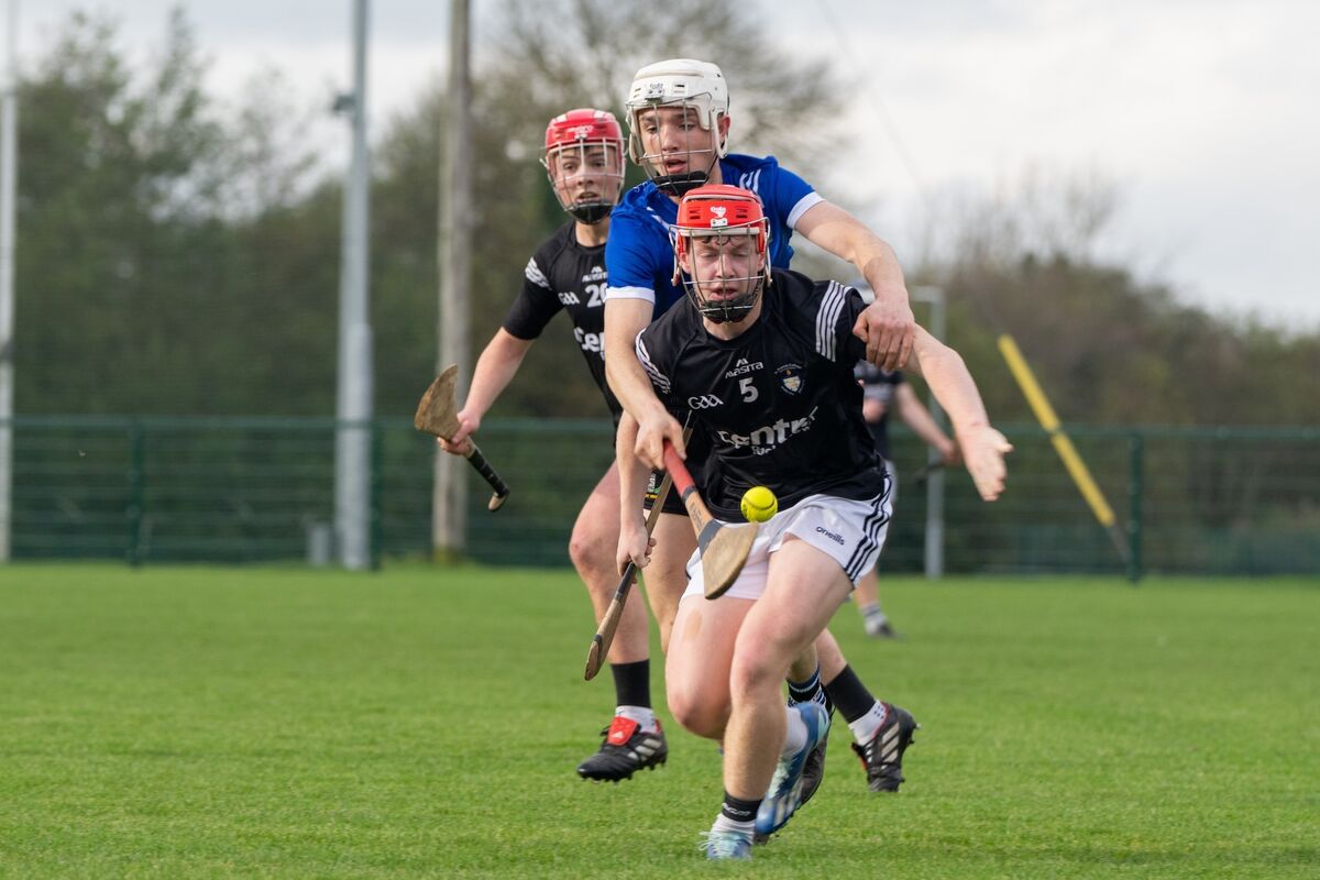 Rochestown’s Diarmuid O’Donoghue is chased by Nenagh’s Shane Cleary during the Dr Harty Cup clash. Picture: Chani Anderson