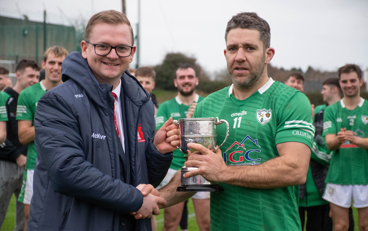  Killeagh captain Davy Kelleher receiving the Jamesy Kelleher Cup from Patrick Mulcahy, secretary of the Imokilly board. Pictutre: Howard Crowdy