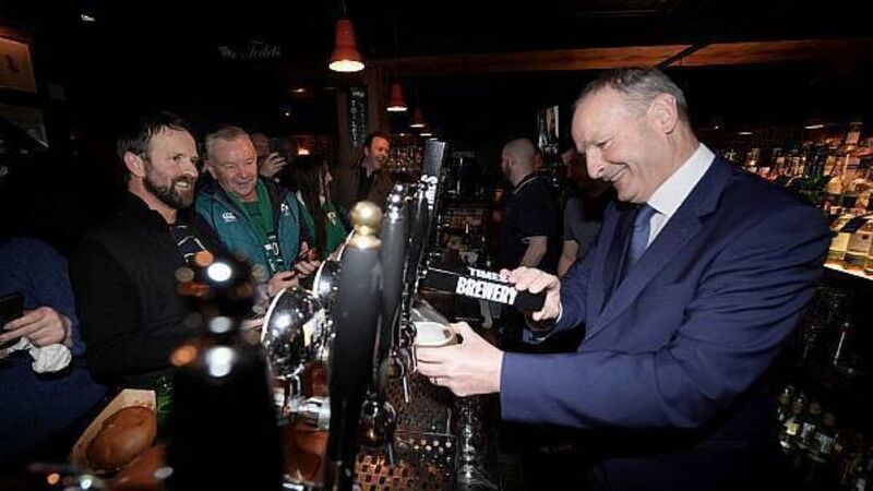 Martin pours pints and Harris meets rugby fans as leaders canvass All Blacks match Martin pours pints and Harris meets rugby fans as leaders canvass All Blacks match