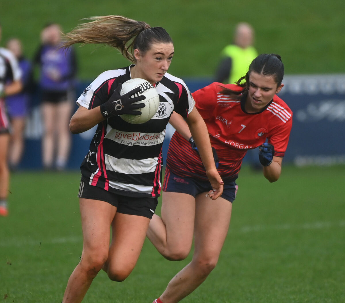 Midleton's Ava McAuliffe takds on Mungret St Paul's Jullian Buckley. Picture: Eddie O'Hare
