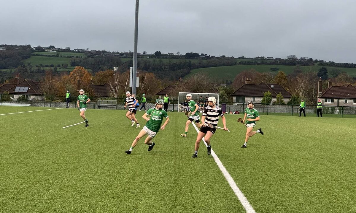 Midleton's Finn Cahill looks to clear downfield ahead of Ballincollig's Evan Stack. Midleton's Finn Cahill looks to clear downfield ahead of Ballincollig's Evan Stack.