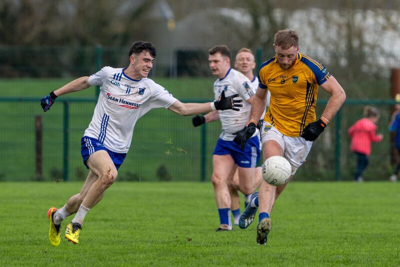 Kilshannig’s Killian O’Hanlon is chased by Rathkeale’s Andrew Meade. Picture: Chani Anderson