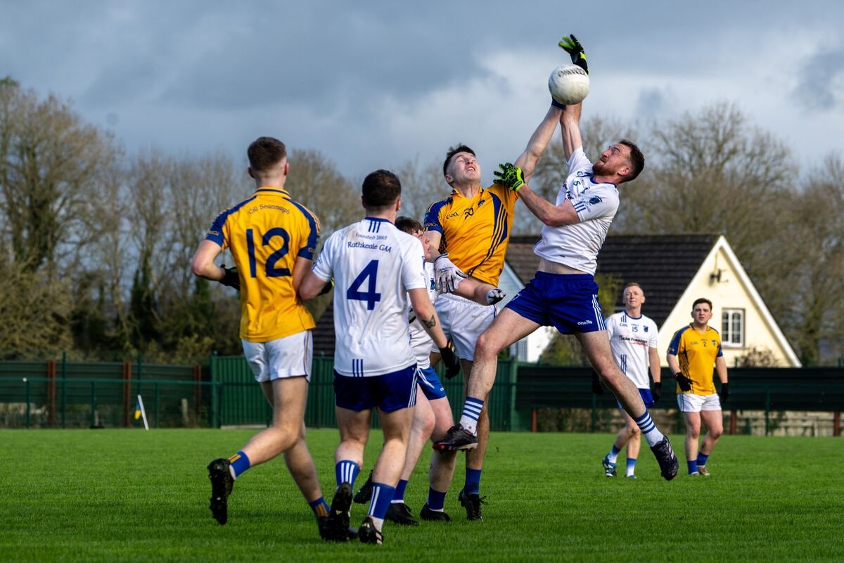 Kilshannig’s Ciaran O’Sullivan and Rathkeale’s Tommy Dillane battle in the air. Picture: Chani Anderson