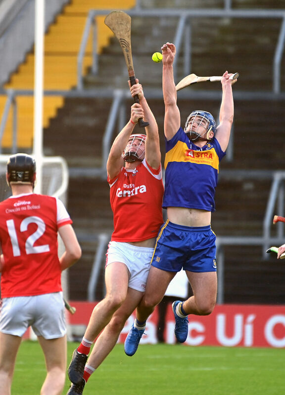 Rhys McCarthy of Carrigaline and Michael O'Driscoll of Watergrasshill go high for the sliothar. Picture: Eddie O'Hare