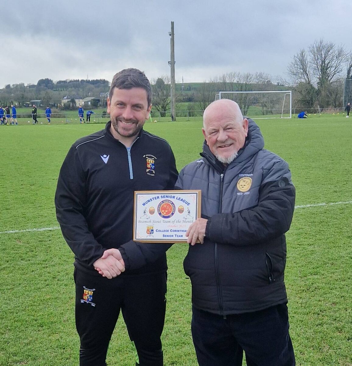 Leslie Doyle presents the Beamish Stout Team of the Month award for December to College Corinthians manager Gary Hackett ahead of their game with Carrigaline United. Leslie Doyle presents the Beamish Stout Team of the Month award for December to College Corinthians manager Gary Hackett ahead of their game with Carrigaline United.