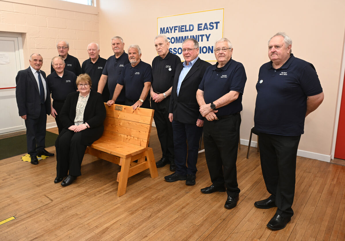 Members of the Men’s Shed with Eddie Carey and Brid’s daughter, Marie Coakley, at the ceremony.