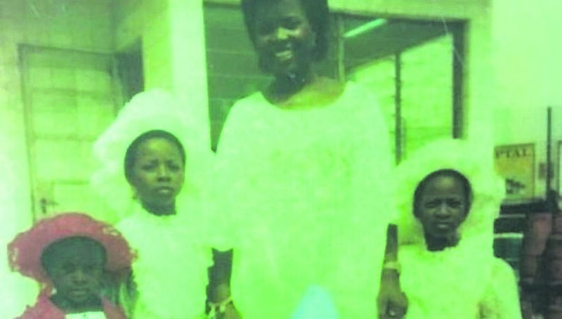 Deborah (in red) with her mother and her sisters, Joan and Bawo.