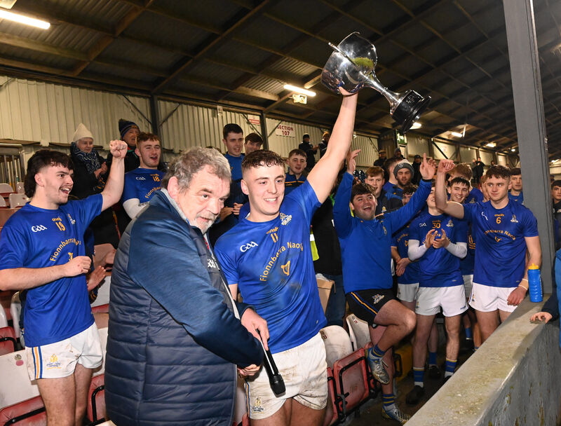 Mick Buckley, chairman Seandún, presents the trophy to St Finbarr's captain Ben Cunningham. Picture: Eddie O'Hare