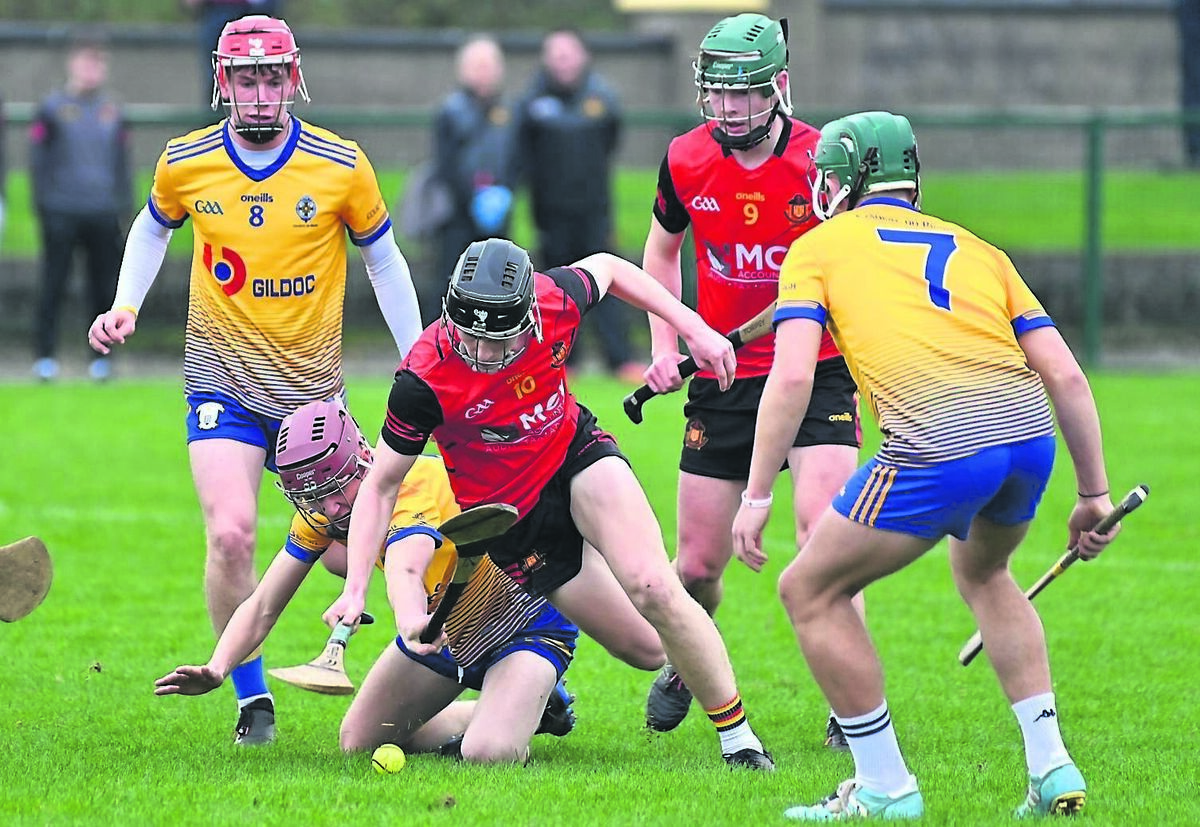 Ben Mayer of Christian Brothers College challenges for possession against Rice College. Picture: Dan Linehan