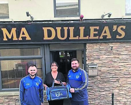 Ballyphehane Celtic captain Niall Kennedy and manager James Corcoran, alongside Rita Hannigan from Ma Dullea’s. Picture: Ballyphehane Celtic
Ballyphehane Celtic captain Niall Kennedy and manager James Corcoran, alongside Rita Hannigan from Ma Dullea’s. Picture: Ballyphehane Celtic