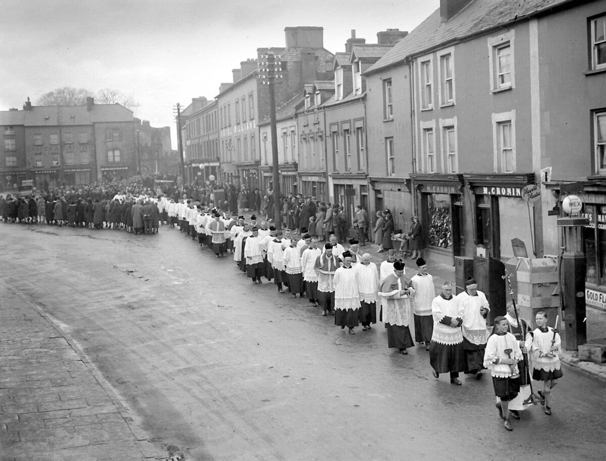 Altar boys lead the way at the funeral of Dean Higgins, Parish Priest, at Macroom, Co. Cork, on March 6, 1930