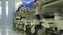 Hospital corridor with gurneys