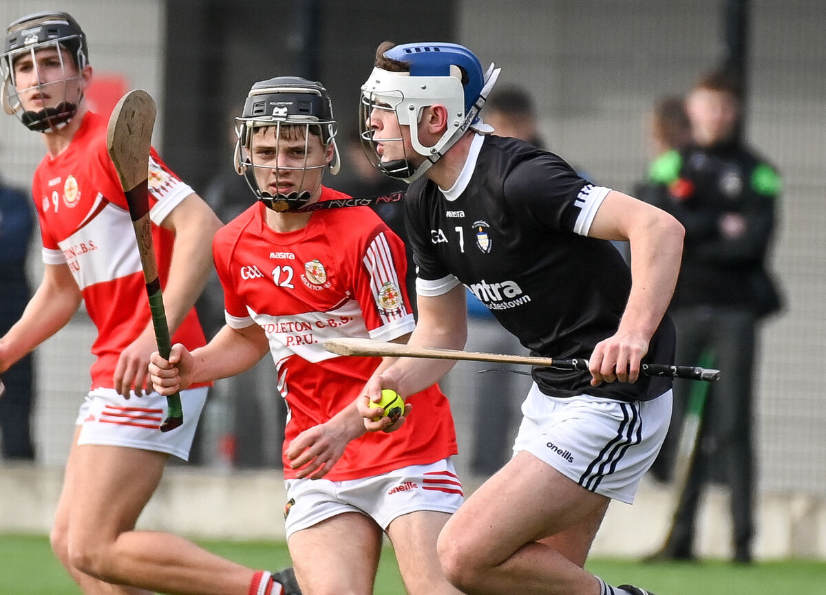 Alex Geary of St Francis College Rochestown breaks past Tadhg O'Donoghue Brosnan of Midleton CBS. Picture: David Keane