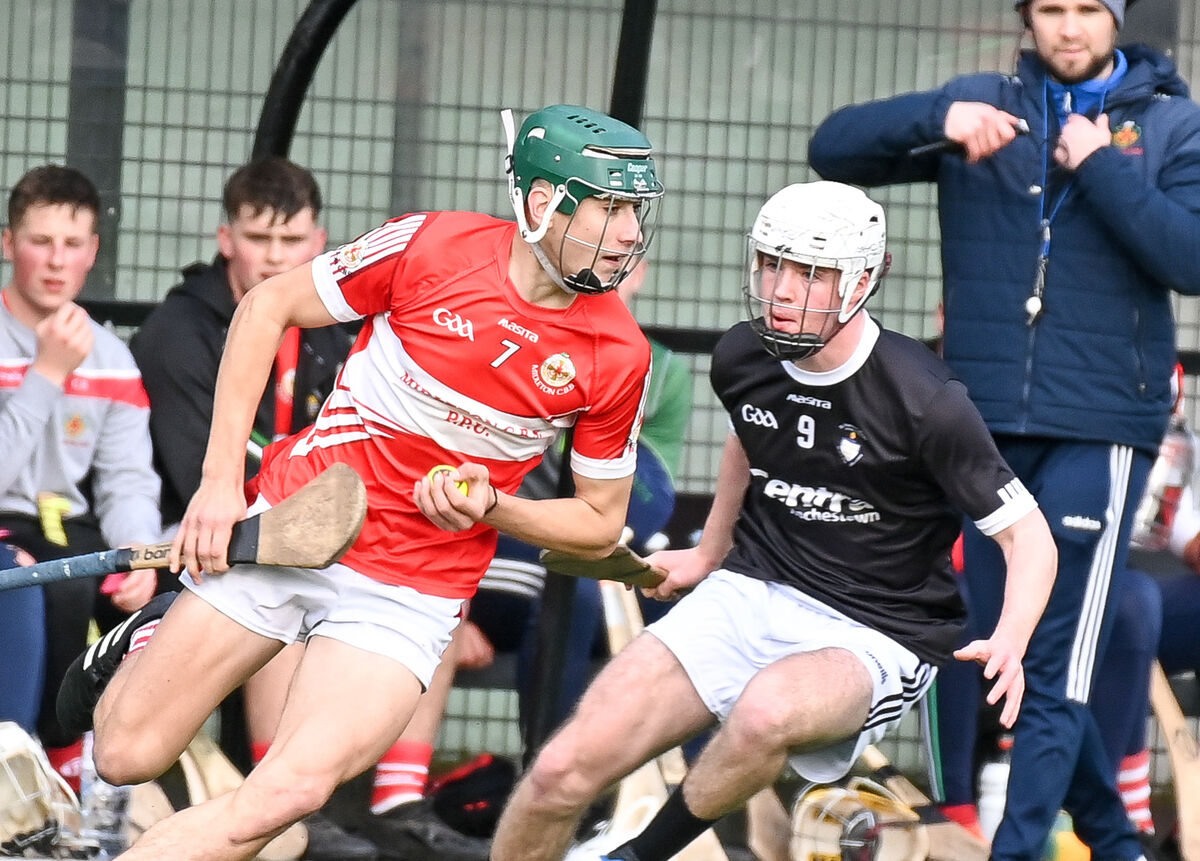 Colm Garde of Midleton CBS tries to get away from Jack O'Brien of St Francis College Rochestown. Picture: David Keane