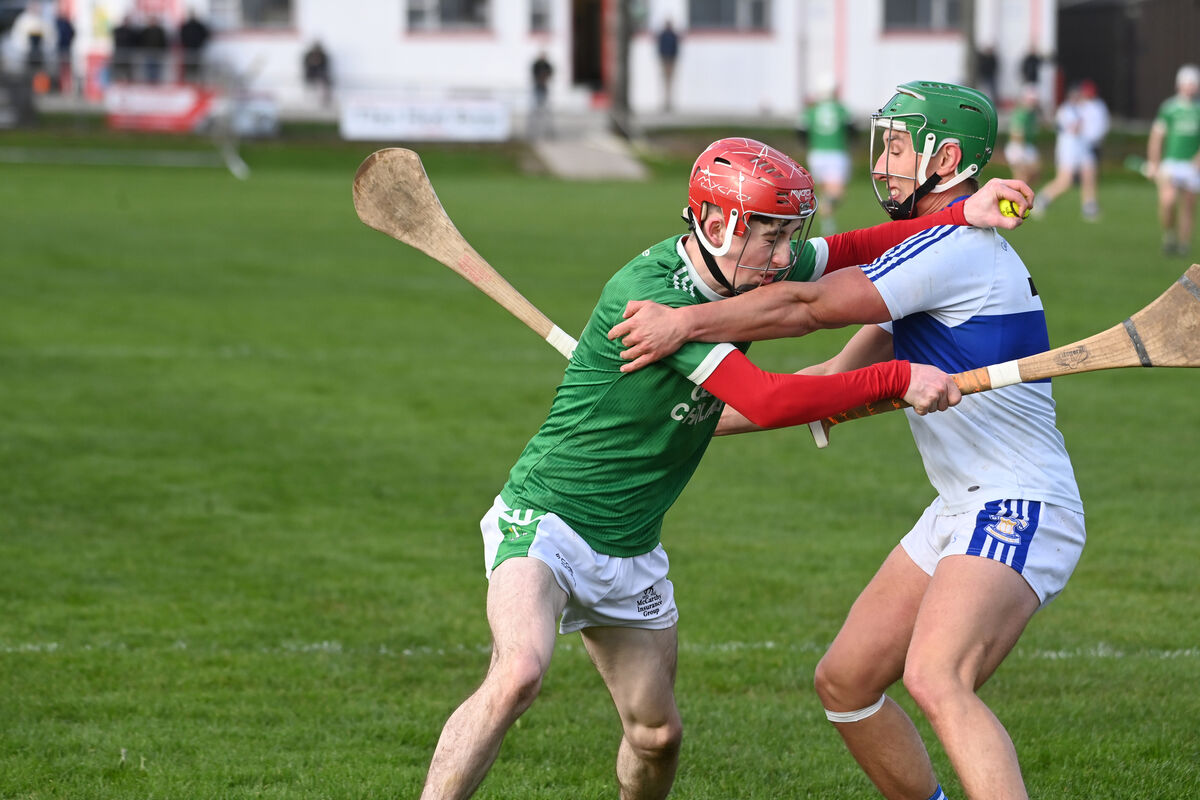  Ben Knox with possession for St Colman's College against Cian Ó Gealbháin of Gaelcholáiste Mhuire AG. Picture: Larry Cummins