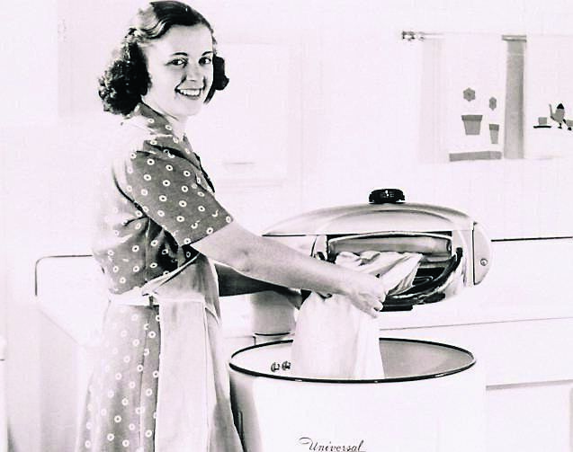 BUSY LIVES: File image of a housewife doing the laundry