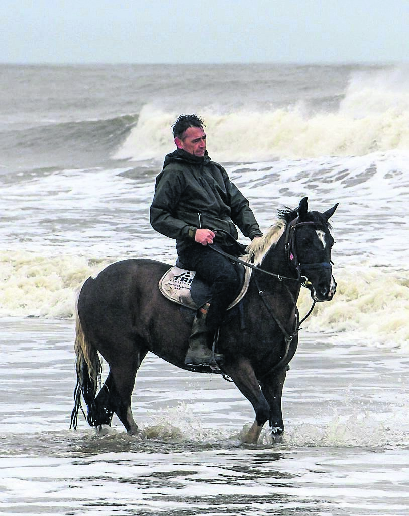 MAN AND BEAST IN HARMONY: Davy Russell taking a walk along Claycastle Beach in his native Youghal. Picture Dan Linehan