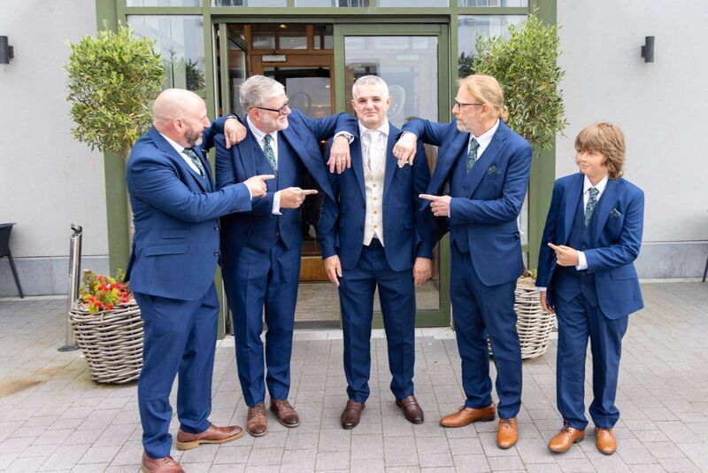 Paul with his brother Martin as best man, his brother Sean and brother- in-law Jerry as groomsmen, and his nephew Stanley as page boy.