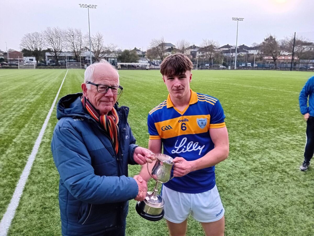 Mike Nash from Munster Schools GAA presenting the U17 C Munster title to Kinsale captain Aaron Keane. Picture: JJ Hurley. Mike Nash from Munster Schools GAA presenting the U17 C Munster title to Kinsale captain Aaron Keane. Picture: JJ Hurley.