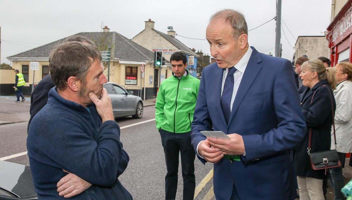 Tánaiste Micheál Martin speaks with John O’Callaghan on the subject of housing while out canvassing in Carrigtwohill. Picture: David Creedon Tánaiste Micheál Martin speaks with John O’Callaghan on the subject of housing while out canvassing in Carrigtwohill. Picture: David Creedon