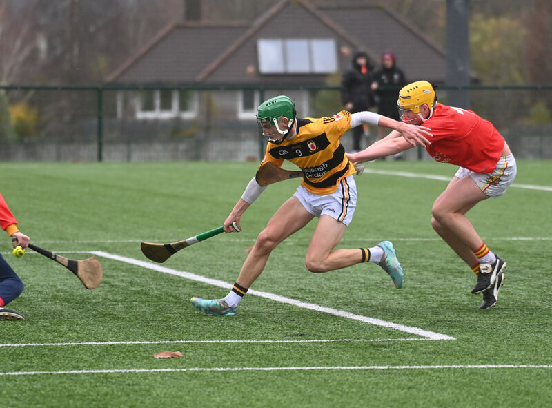 Na Piarsaigh's Shay O'Neill flicks the sliotar past Mallow goalkeeper Eoghan Cregg with Conor Carroll tackling. Picture: Eddie O'Hare Na Piarsaigh's Shay O'Neill flicks the sliotar past Mallow goalkeeper Eoghan Cregg with Conor Carroll tackling. Picture: Eddie O'Hare