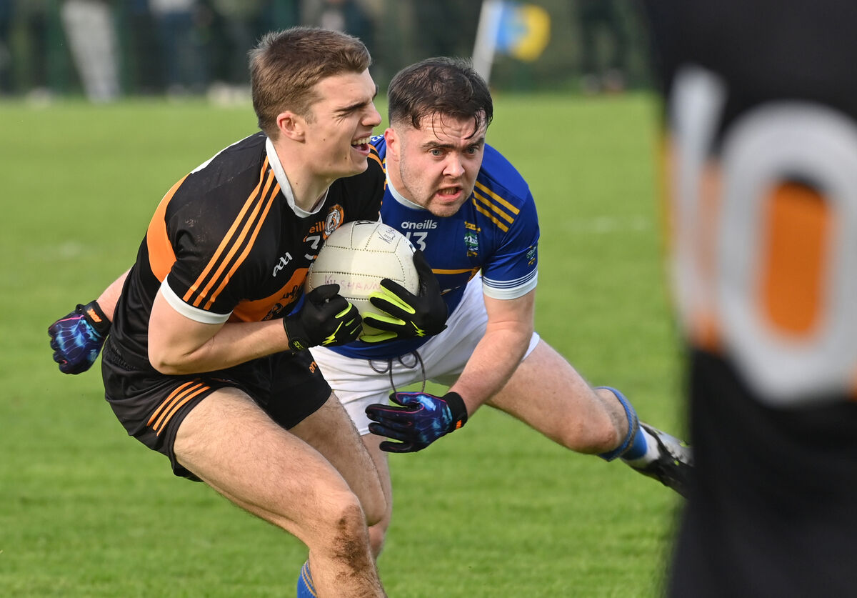  Dylan Casey of Austin Stacks is tackled by Kilshannig's Diarmuid O'Sullivan. Picture: Dan Linehan