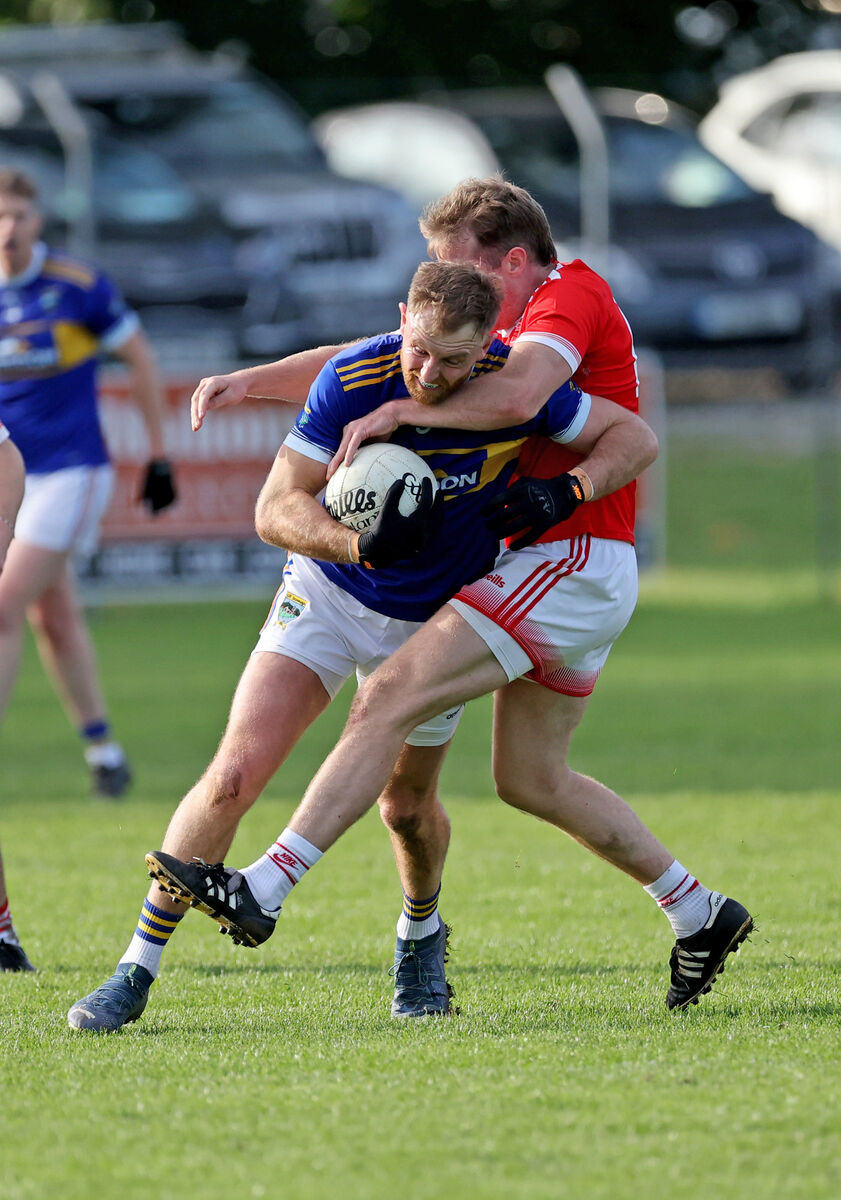  Killian O'Hanlon, Kilshannig, battling Barry O'Leary, Uibh Laoire. Picture: Jim Coughlan.