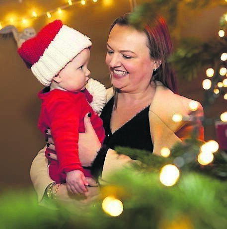 Síle and Alfie Murdoch enjoying Santa’s Nordic tipi at Douglas Village Shopping Centre, which runs until December 23. 	Picture: Darragh Kane
                    