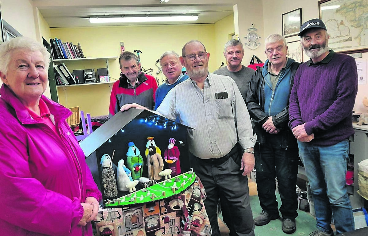 Blackpool Men’s Shed made a beautiful wooden crib and presented it to the Blackpool Knitting Group who had knitted a nativity scene which they will raffle at the Blackpool Christmas Market on December 6. Noel Donovan of Blackpool Men’s shed presented it to Shirley Whelan of Blackpool Knitting Group.